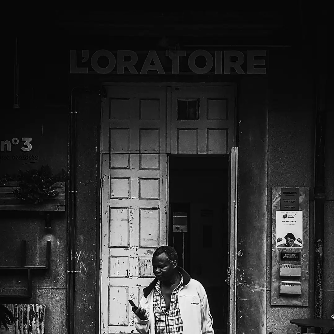 Man standing in Paris Street